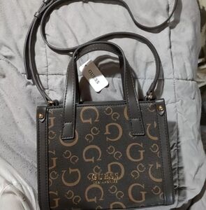 Guess logo bag. Small satchel with crossbody strap.